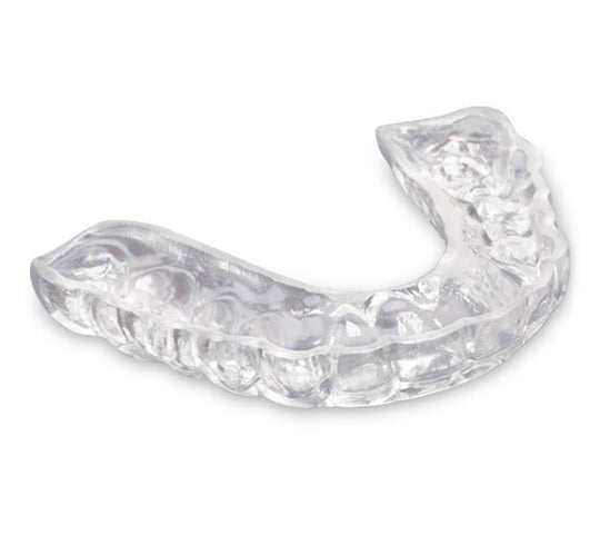 Clear Retainers vs. Night Guards: How to Choose the Best Solution for Teeth Grinding